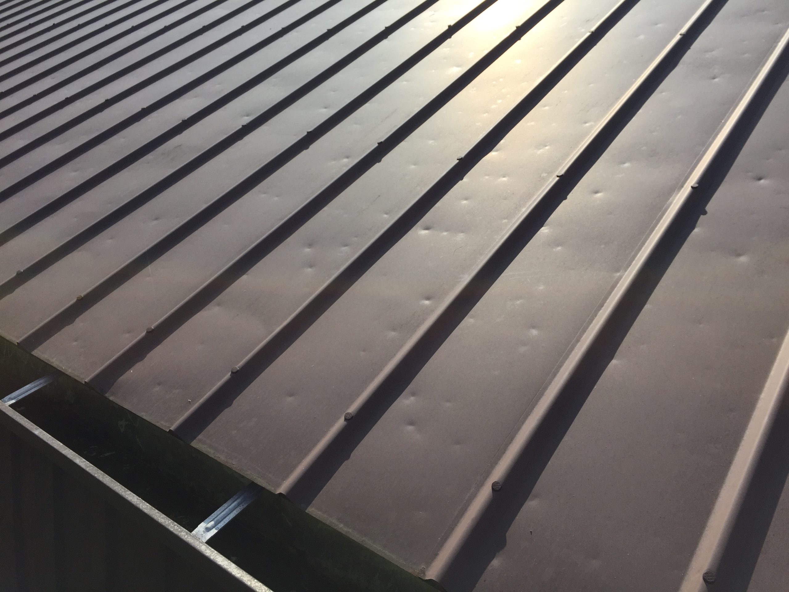 How to Identify and Fix Roof Hail Damage? The Roof Guys